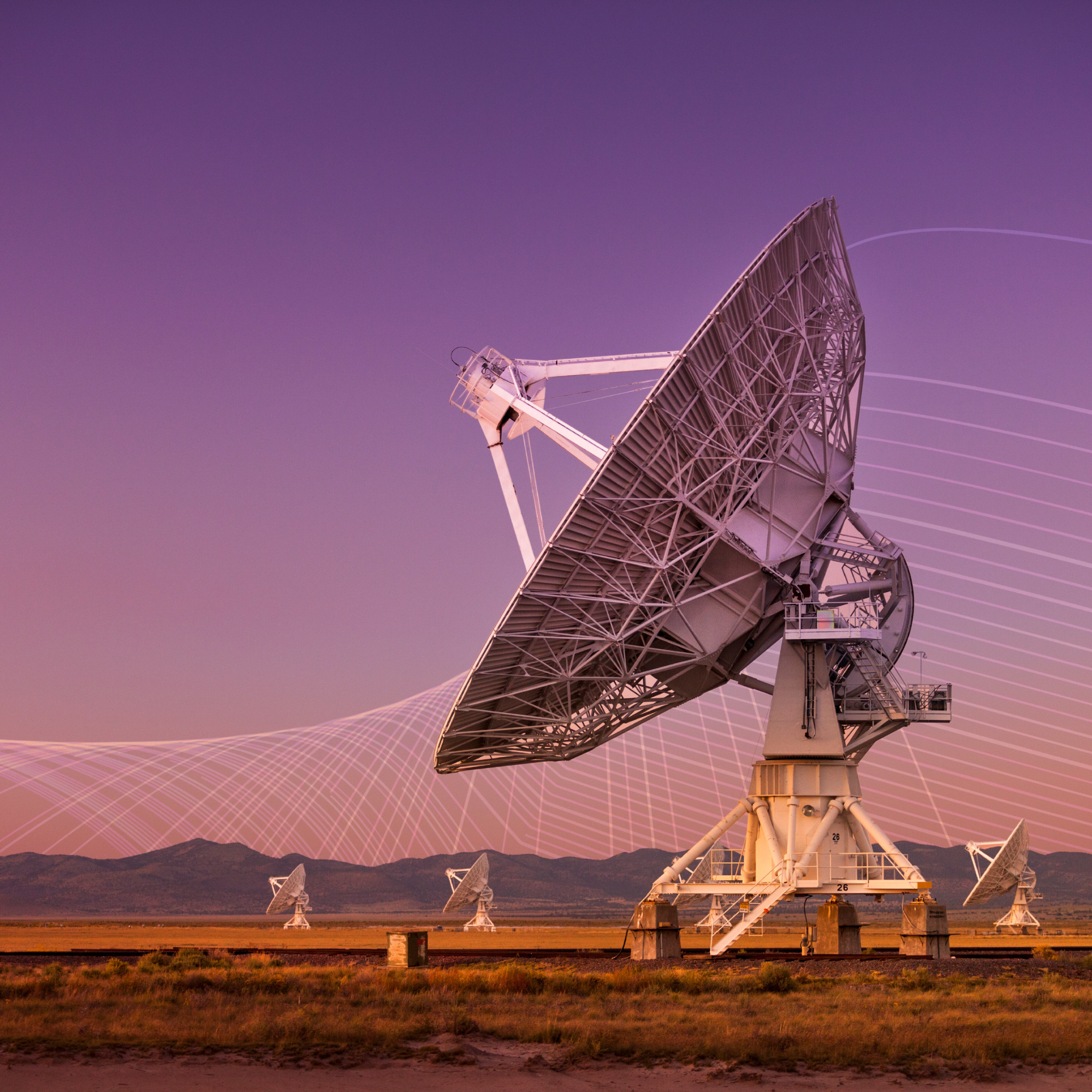 Large radio telescopes point into the sky
