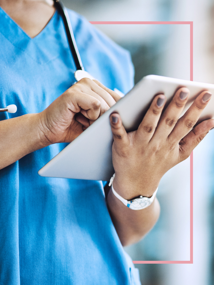 A nurse filling out a form