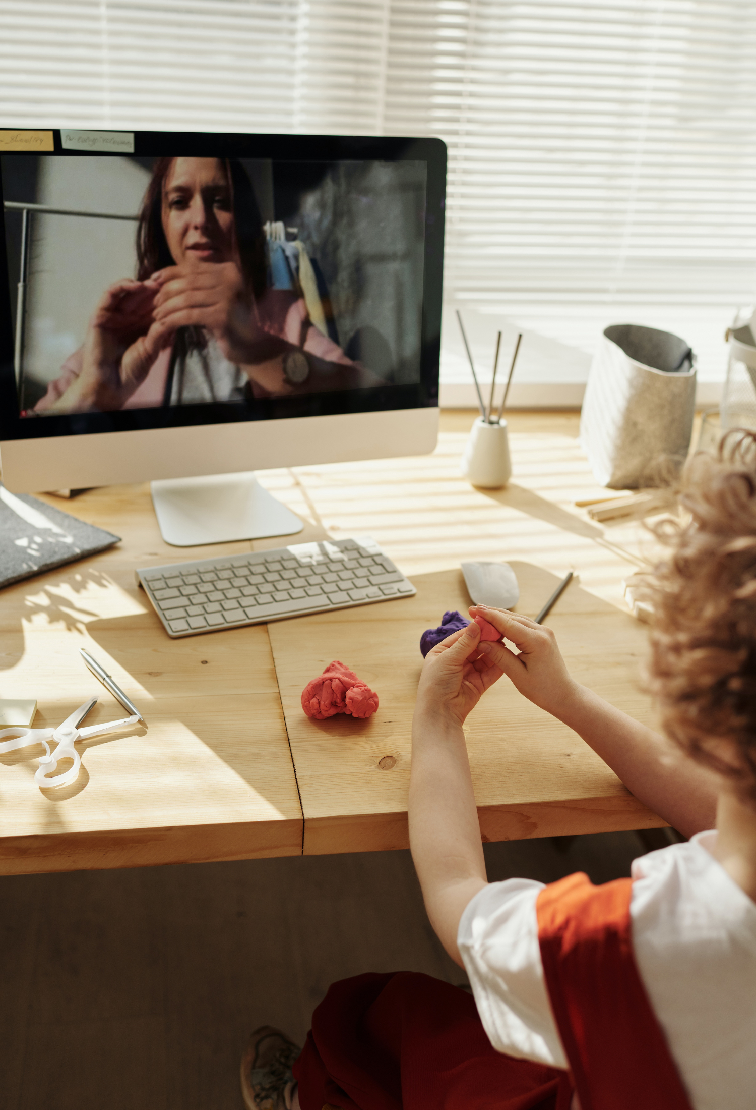 A young child takes part in an online class