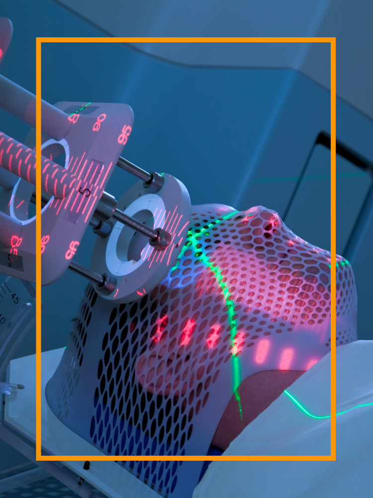 A man undergoing radiotherapy on his head