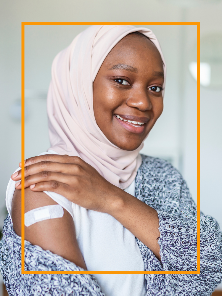 A woman with a plaster on her arm