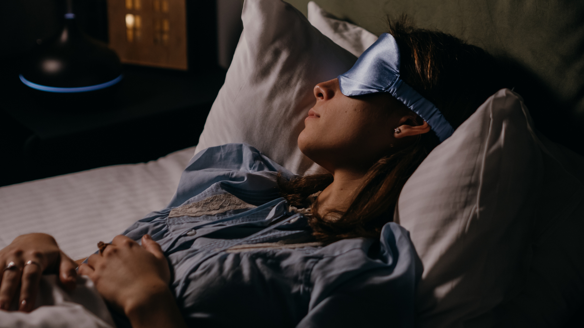 Someone sleeping with an eye mask on 