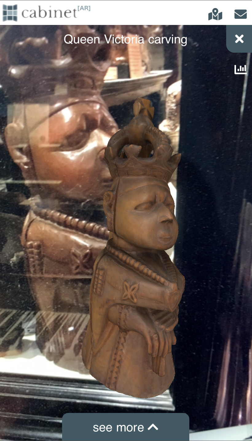 A carving of Queen Victoria in the Pitt Rivers Museum rendered in augmented reality via the Cabinet app