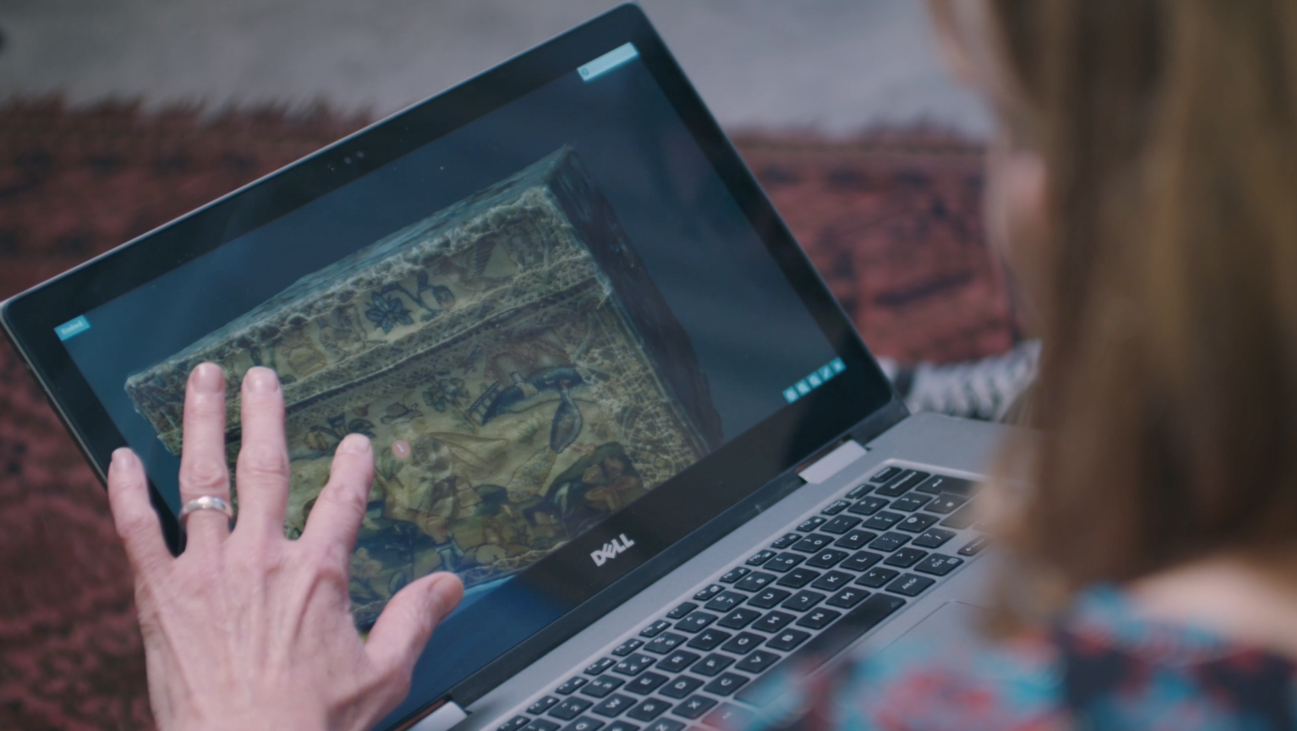 Someone exploring a 3D object on a laptop