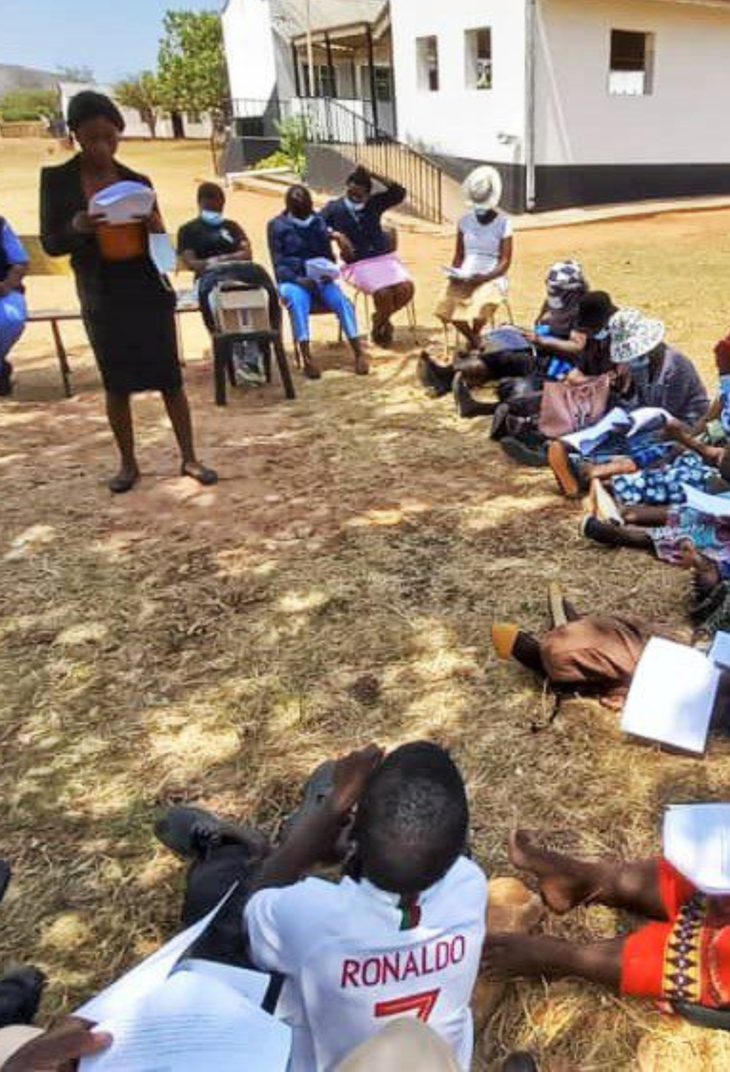 People sitting together filling out a survey