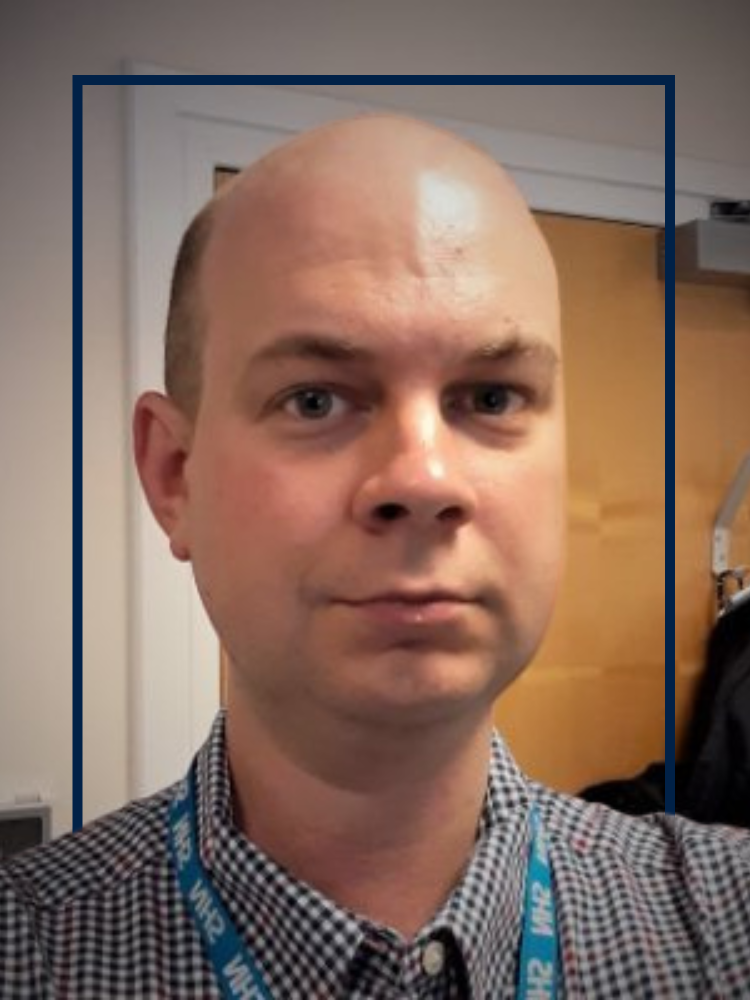 A selfie taken by Dr Tom Whyntie, wearing an NHS lanyard