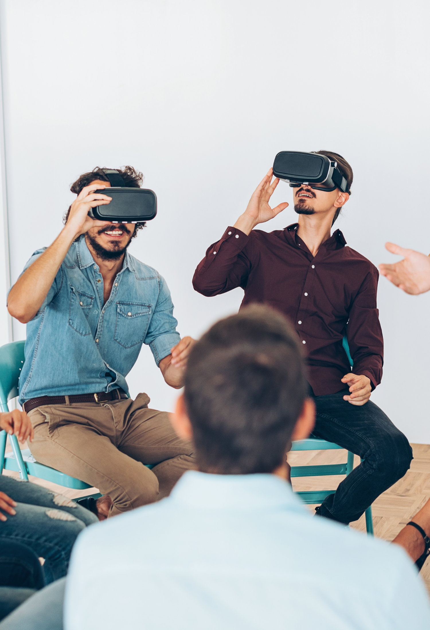 A group of people using VR headsets