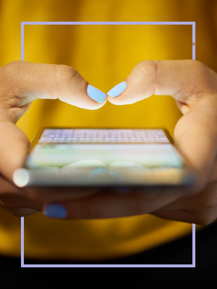 Person typing on a smartphone